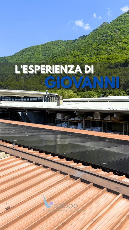L'insegna dell'azienda Martinoli Giacomo con le montagne sullo sfondo